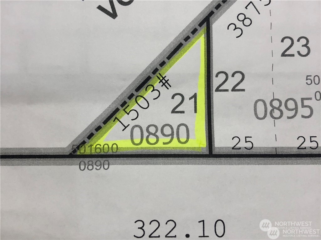 2602 East Thomas Street Seattle, WA 98112 - Photo 5 of 10 a street sign and a book shelf