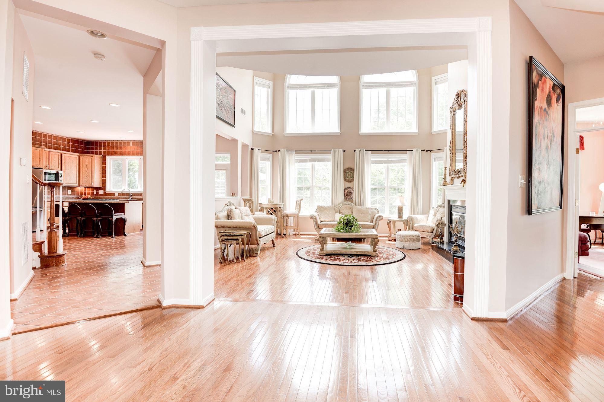 7104 Ayers Meadow Lane Springfield, VA 22150 - Photo 16 of 62 a view of a living room with furniture and a table