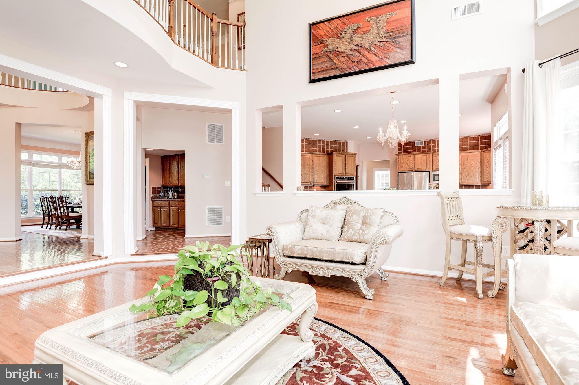 7104 Ayers Meadow Lane Springfield, VA 22150 - Photo 19 of 62 a living room with furniture and a rug