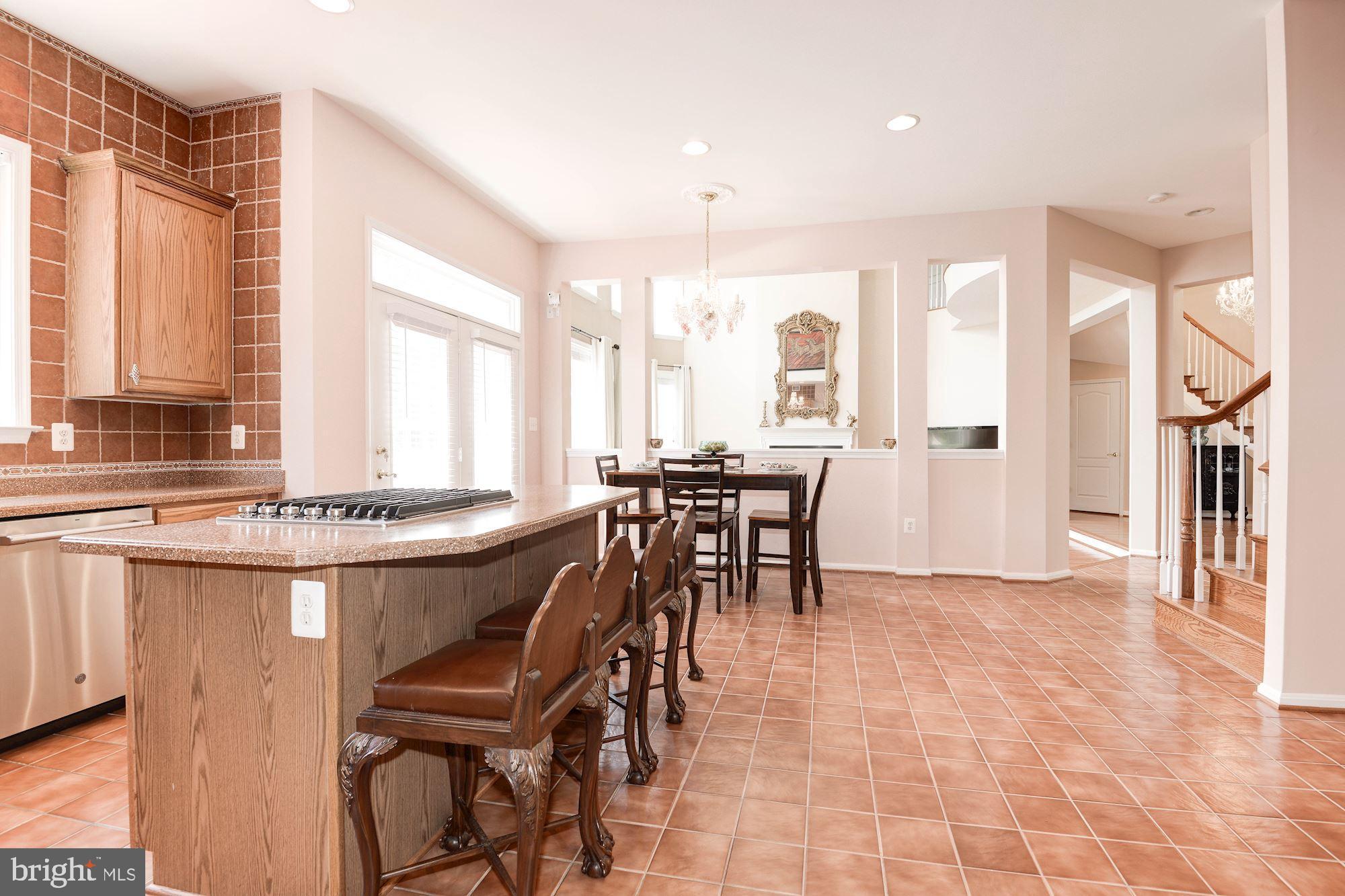 7104 Ayers Meadow Lane Springfield, VA 22150 - Photo 25 of 62 a view of a a dining room with furniture window and outside view