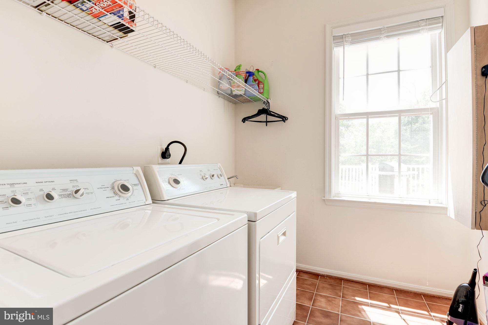 7104 Ayers Meadow Lane Springfield, VA 22150 - Photo 27 of 62 a utility room with dryer and washer