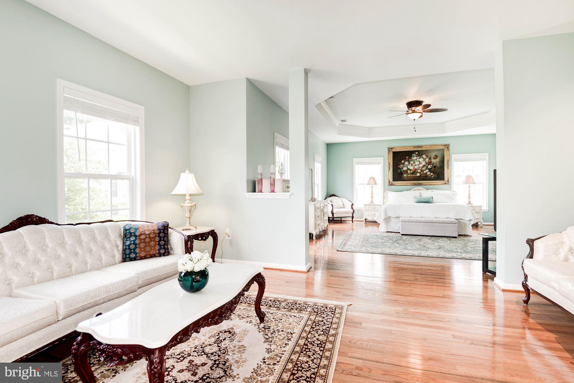 7104 Ayers Meadow Lane Springfield, VA 22150 - Photo 30 of 62 a living room with furniture and wooden floor
