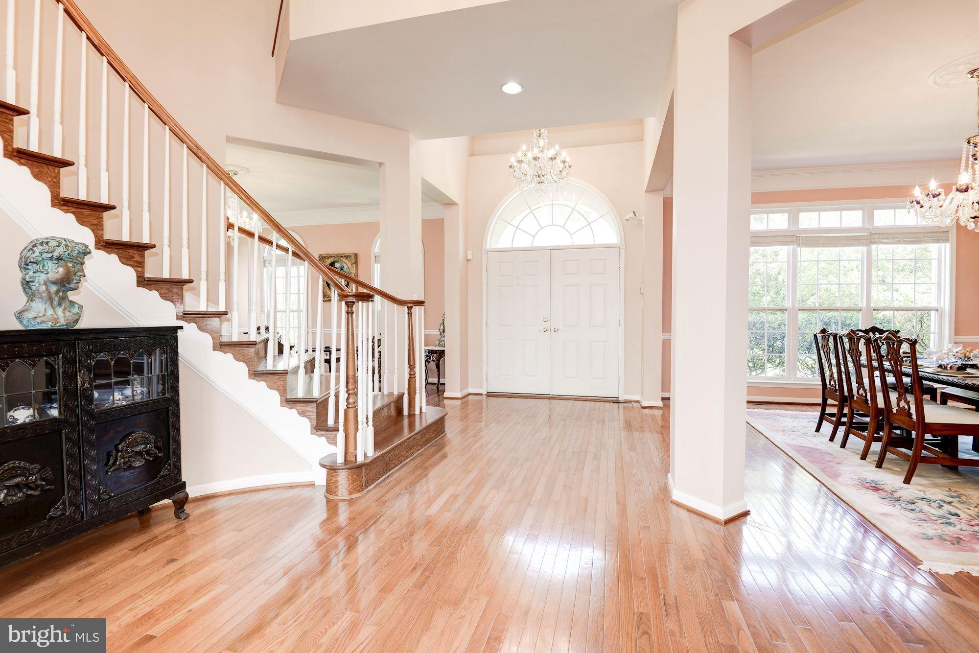 7104 Ayers Meadow Lane Springfield, VA 22150 - Photo 5 of 62 a view of front door with dining room and stairs