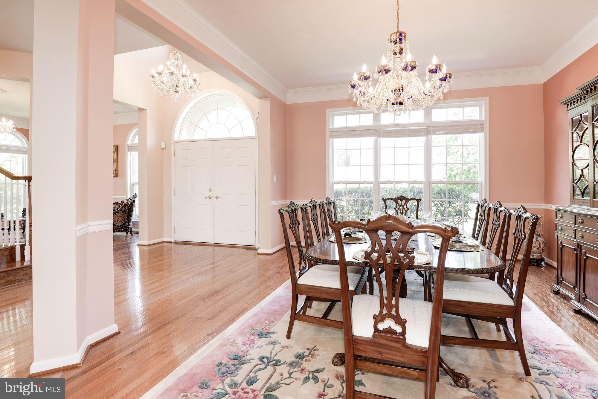 7104 Ayers Meadow Lane Springfield, VA 22150 - Photo 6 of 62 a view of a dining room with furniture window and wooden floor