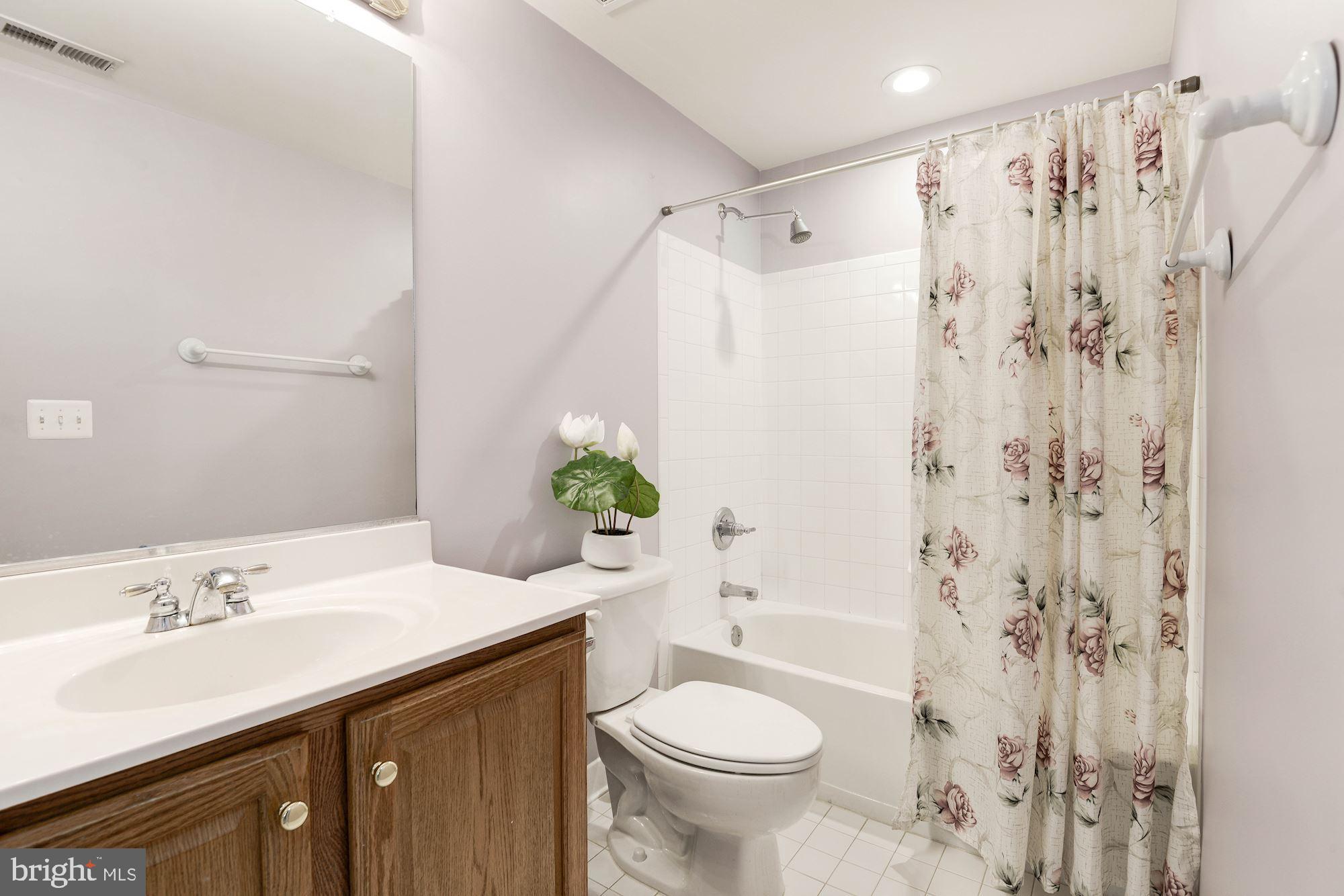 7104 Ayers Meadow Lane Springfield, VA 22150 - Photo 54 of 62 a bathroom with a sink toilet and shower