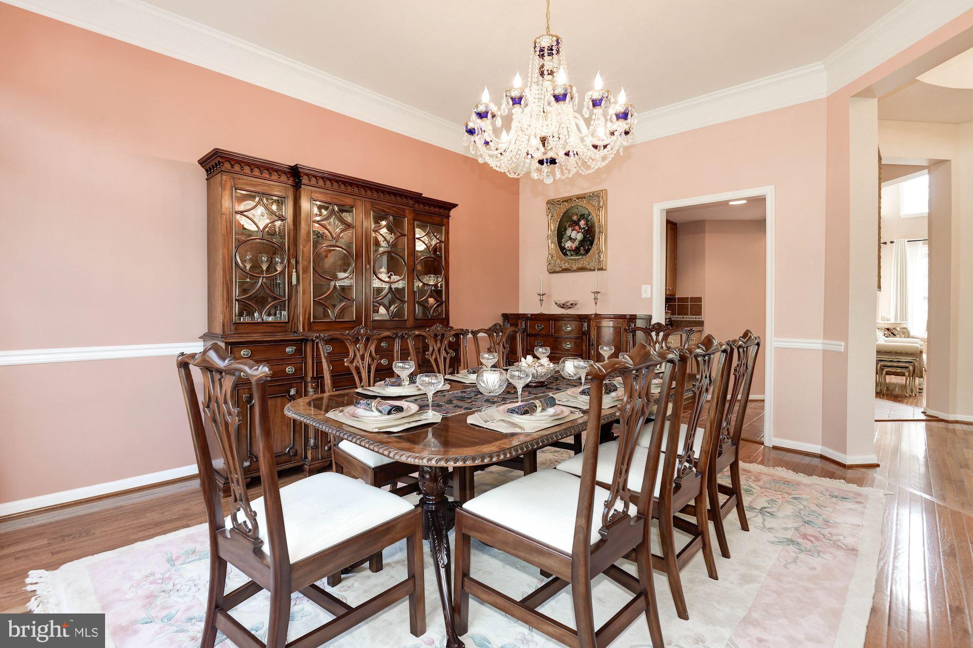 7104 Ayers Meadow Lane Springfield, VA 22150 - Photo 7 of 62 a view of a dining room with furniture window and wooden floor
