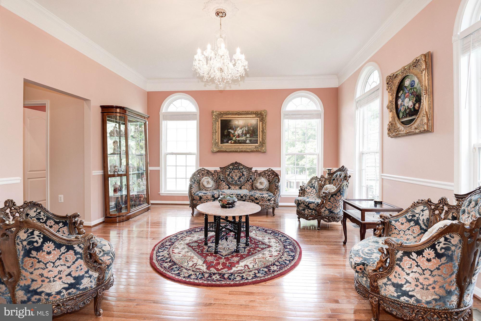 7104 Ayers Meadow Lane Springfield, VA 22150 - Photo 10 of 62 a living room with furniture or couch and a chandelier