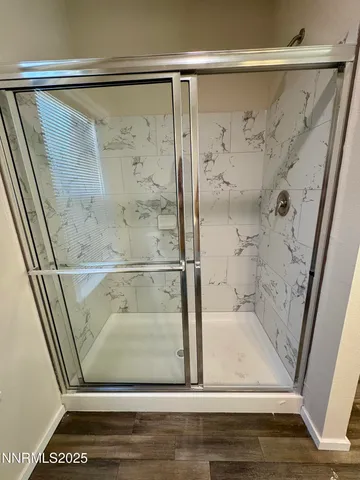 a view of bathroom with a shower