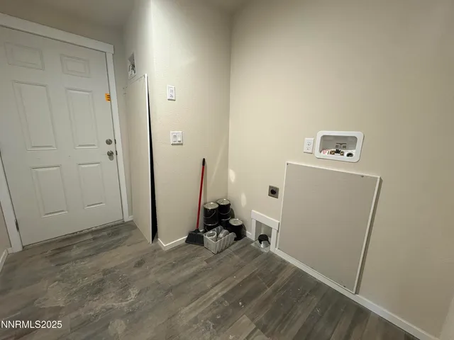 a view of a room with closet and wooden floor