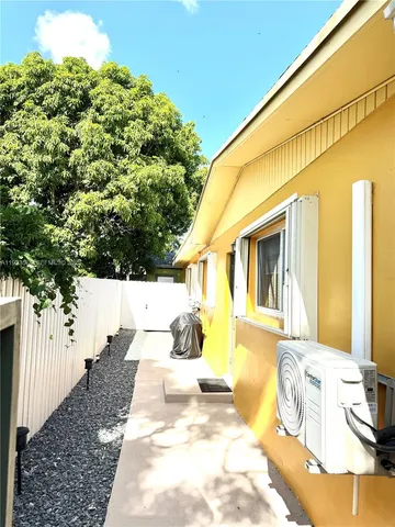 a view of a back yard of the house