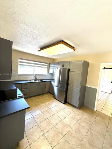 a view of a kitchen with a stove