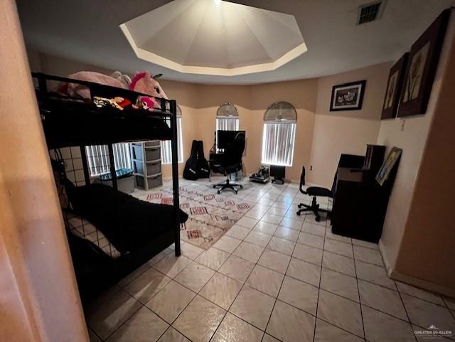 708 Paisano Street Sullivan City, TX 78595 - Photo 5 of 9 Tiled bedroom featuring a tray ceiling