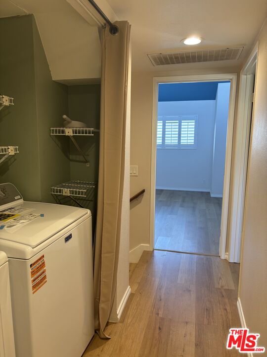 557 East Verdugo Avenue, Unit C Burbank, CA 91501 - Photo 5 of 14 a view of hallway with wooden floor
