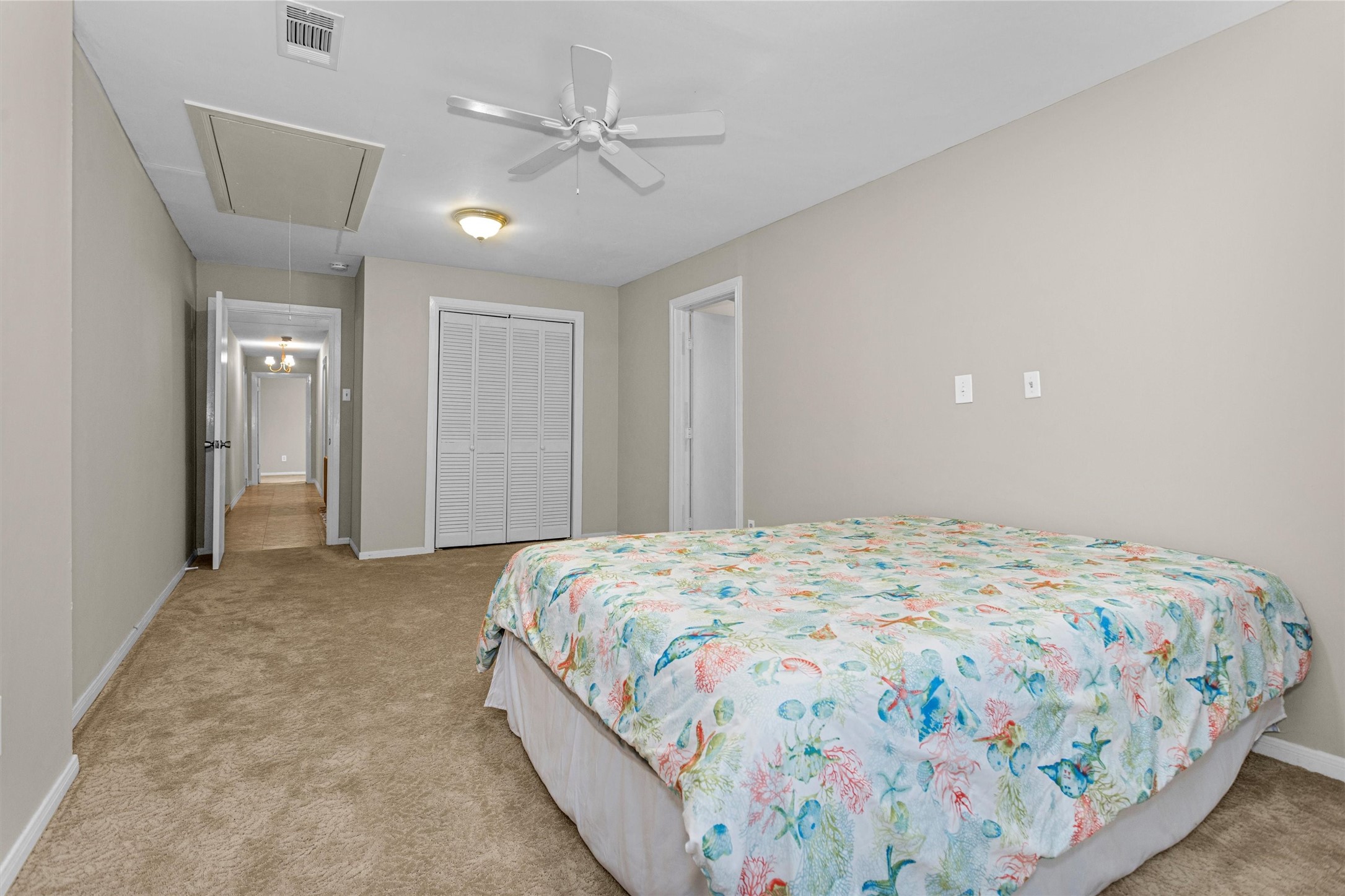 99 Main Street Huntsville, TX 77340 - Photo 24 of 47 Primary bedroom has enough space for large furniture or seating area.