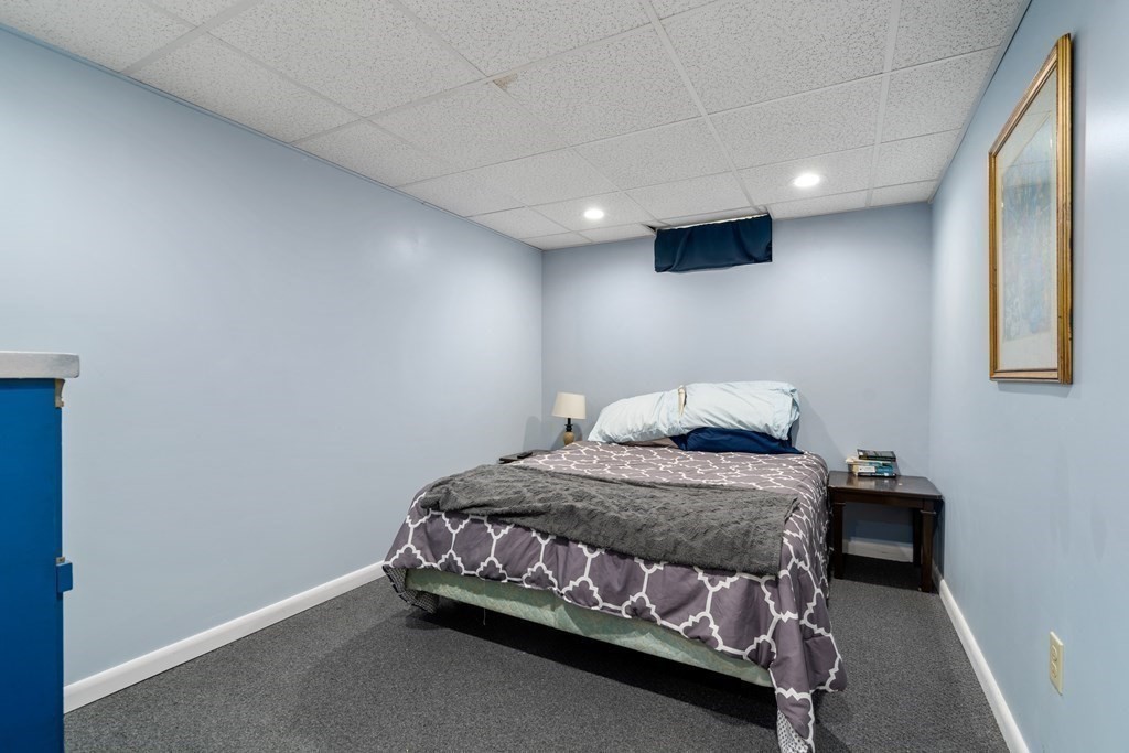 45 Ruggles Street Three Rivers, MA 01080 - Photo 22 of 29 a bedroom with a bed and a window