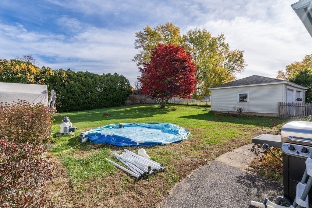45 Ruggles Street Three Rivers, MA 01080 - Photo 26 of 29 a view of a house with a yard and sitting area