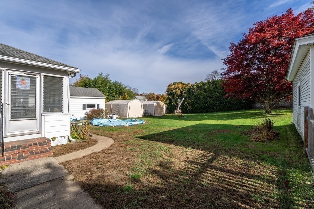 45 Ruggles Street Three Rivers, MA 01080 - Photo 28 of 29 a view of a house with backyard and sitting area