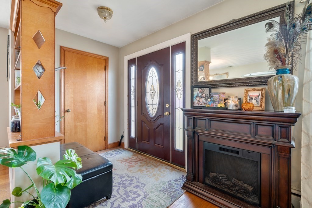 45 Ruggles Street Three Rivers, MA 01080 - Photo 5 of 29 a living room with furniture and a fireplace