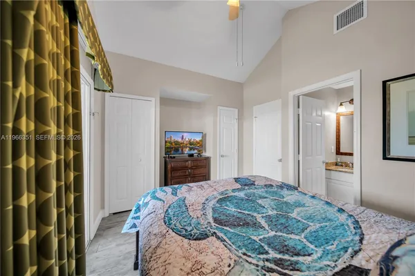 a living room with a bed and a couch