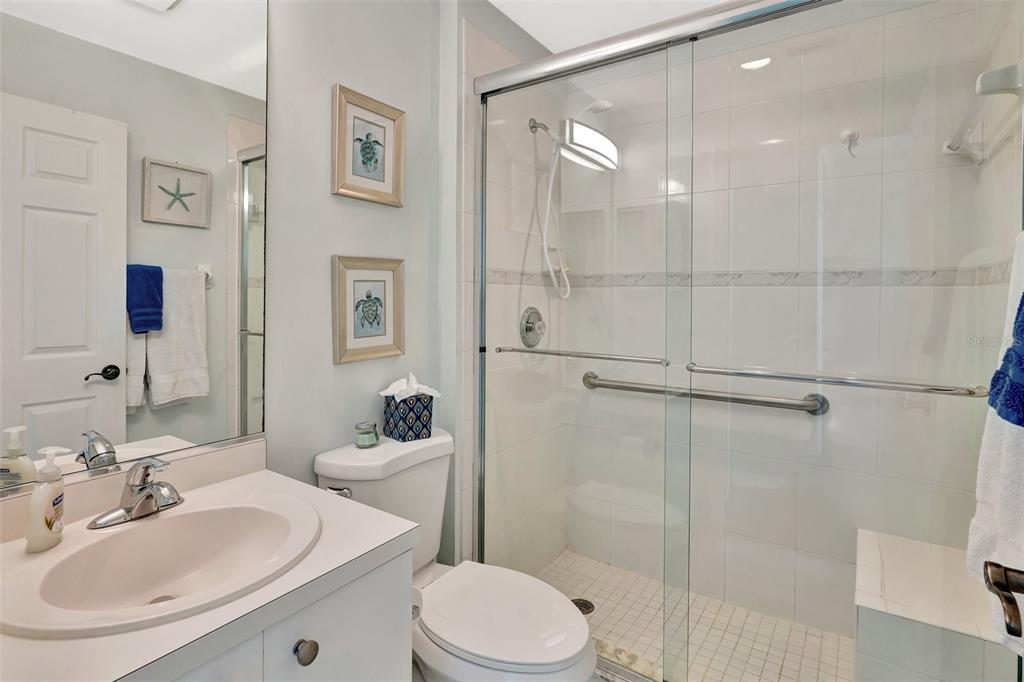 2090 Matecumbe Key Road, Unit 1708 Punta Gorda, FL 33955 - Photo 19 of 34 a bathroom with a sink toilet and shower