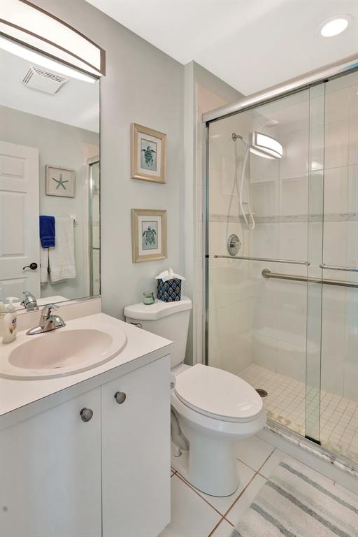 2090 Matecumbe Key Road, Unit 1708 Punta Gorda, FL 33955 - Photo 20 of 34 a bathroom with a sink toilet and shower