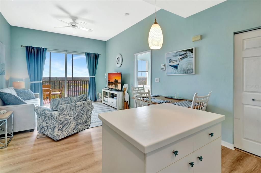 2090 Matecumbe Key Road, Unit 1708 Punta Gorda, FL 33955 - Photo 8 of 34 a living room with furniture and a flat screen tv