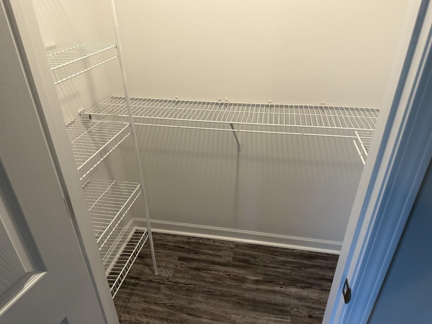 712 Keeshono St Union, Unit 712 Union City, GA 30291 - Photo 13 of 22 a view of a room with racks on the wall