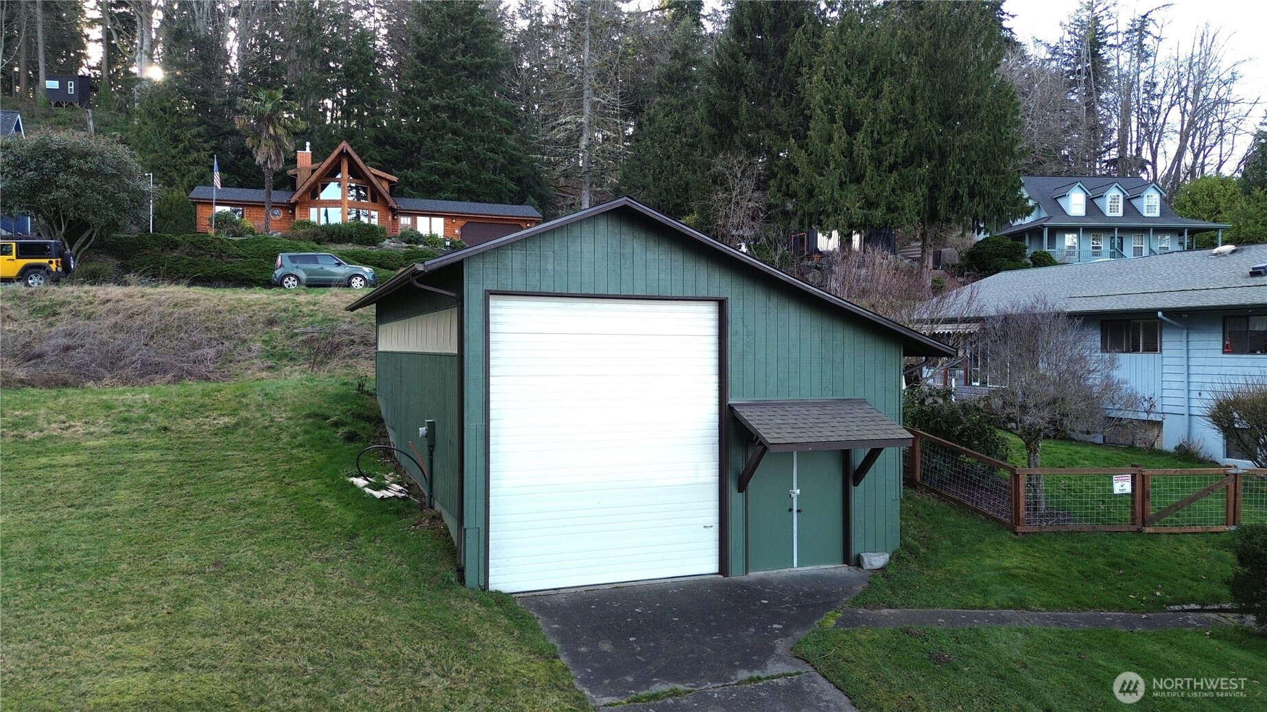 4116 Mitchell Drive Anacortes, WA 98221 - Photo 37 of 39 a front view of a house with a yard