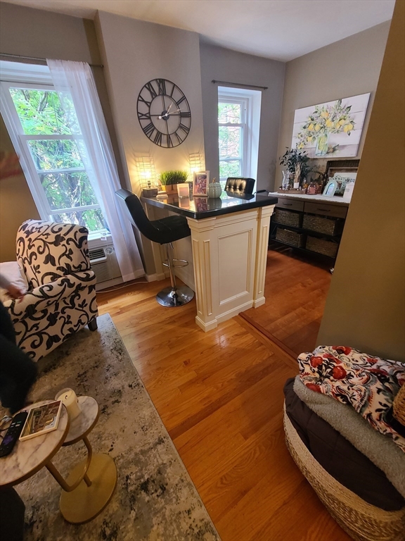 32 Fleet Street, Unit 5 Boston, MA 02113 - Photo 4 of 12 a very nice looking room with a large window
