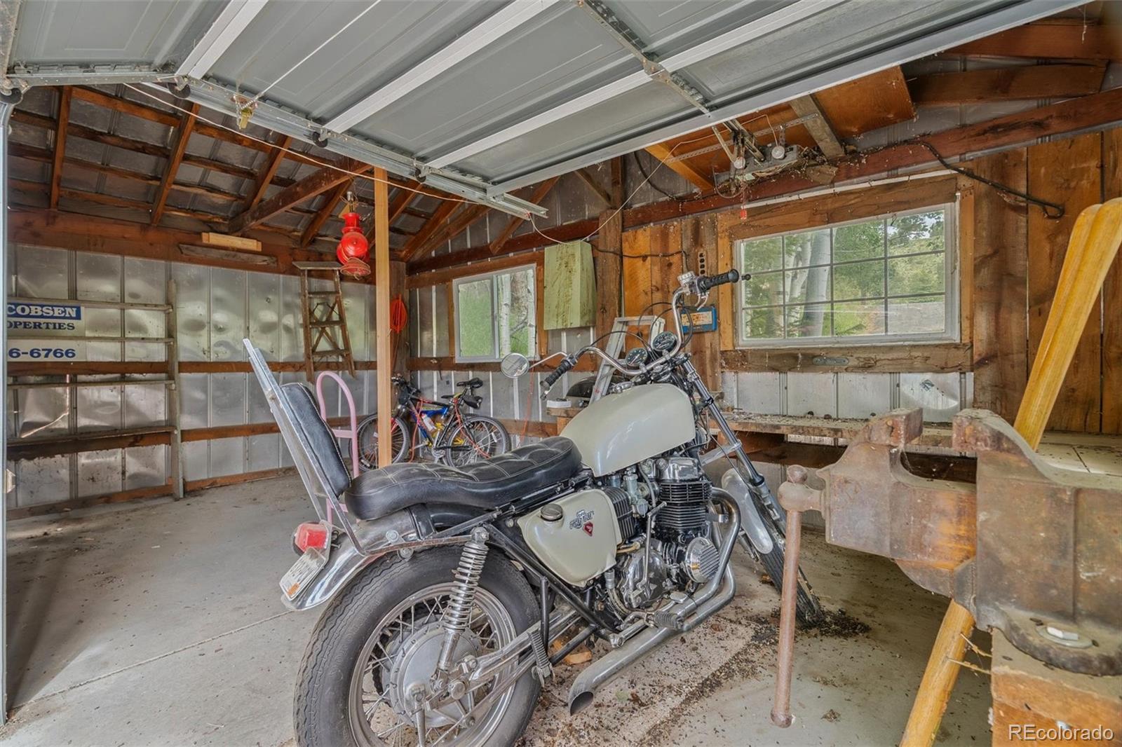 3909 County Road 72 Bailey, CO 80421 - Photo 45 of 50 a view of a dining room with furniture window and outside view