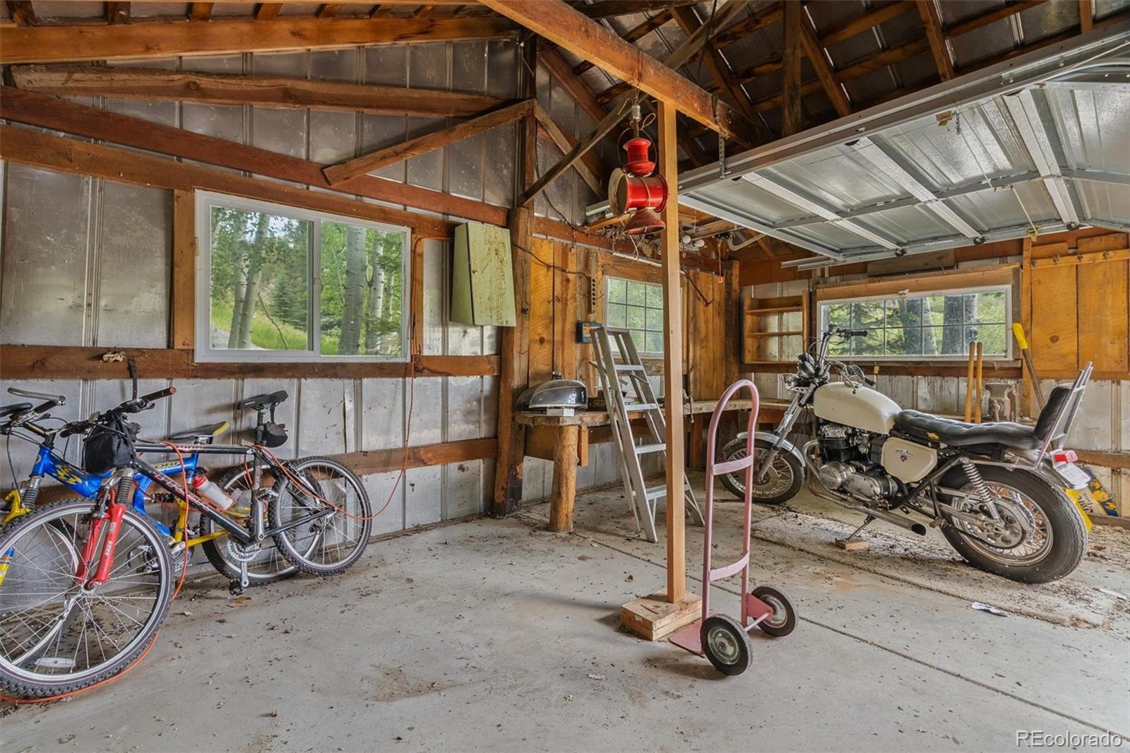 3909 County Road 72 Bailey, CO 80421 - Photo 46 of 50 a view of a room with gym equipment