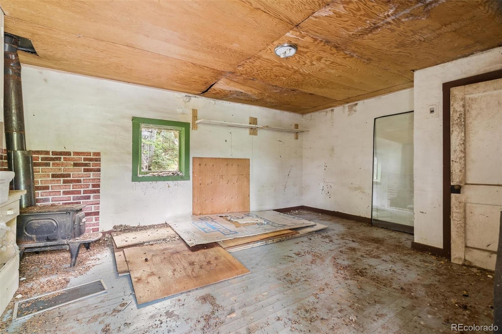 3909 County Road 72 Bailey, CO 80421 - Photo 50 of 50 a view of livingroom with furniture and windows