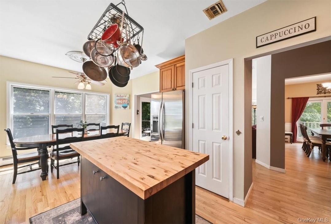 613 Rte 9W Piermont, NY 10968 - Photo 12 of 37 a kitchen with a table and chairs in it