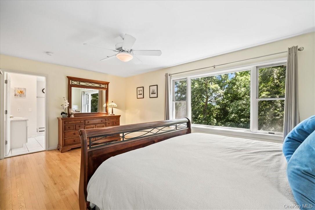 613 Rte 9W Piermont, NY 10968 - Photo 18 of 37 a bedroom with a bed and wooden floor