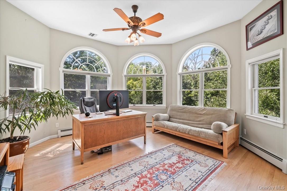 613 Rte 9W Piermont, NY 10968 - Photo 22 of 37 a living room with furniture and a large window