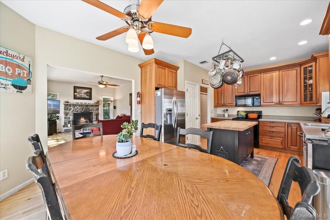 613 Rte 9W Piermont, NY 10968 - Photo 8 of 37 a room with stainless steel appliances kitchen island granite countertop furniture and a view of kitchen