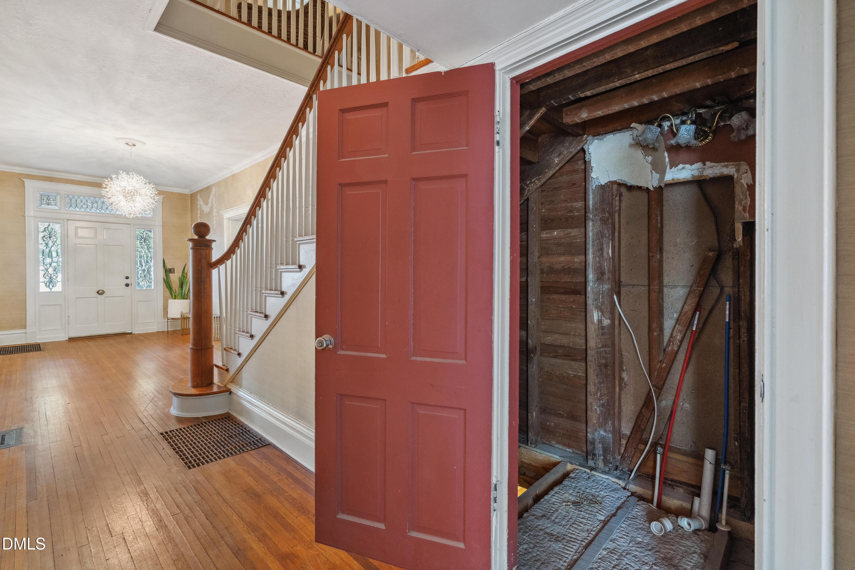 116 Hawthorne Road Raleigh, NC 27605 - Photo 25 of 61 a view of a hallway with wooden floor and staircase
