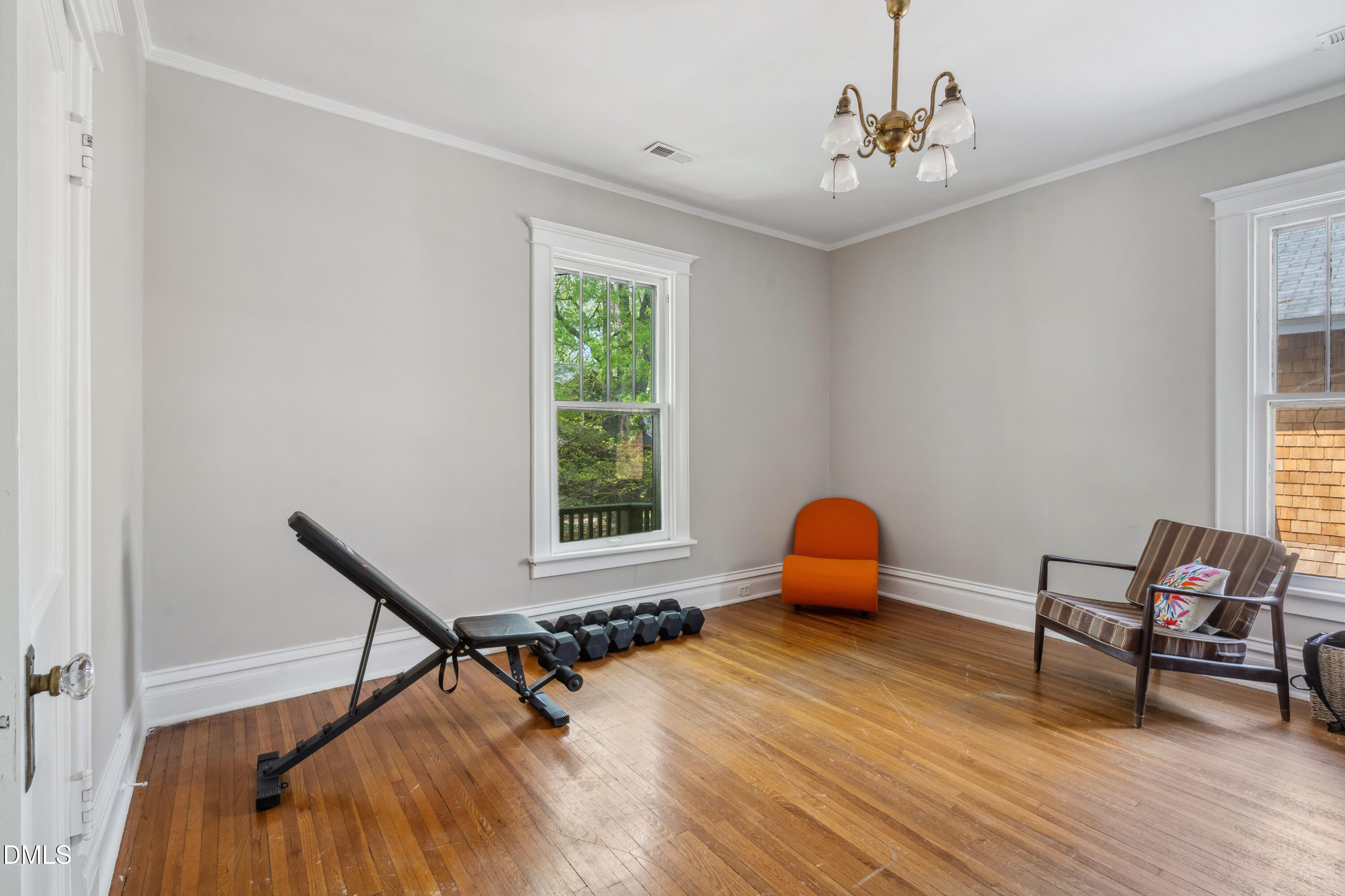 116 Hawthorne Road Raleigh, NC 27605 - Photo 36 of 61 a room with furniture and a window