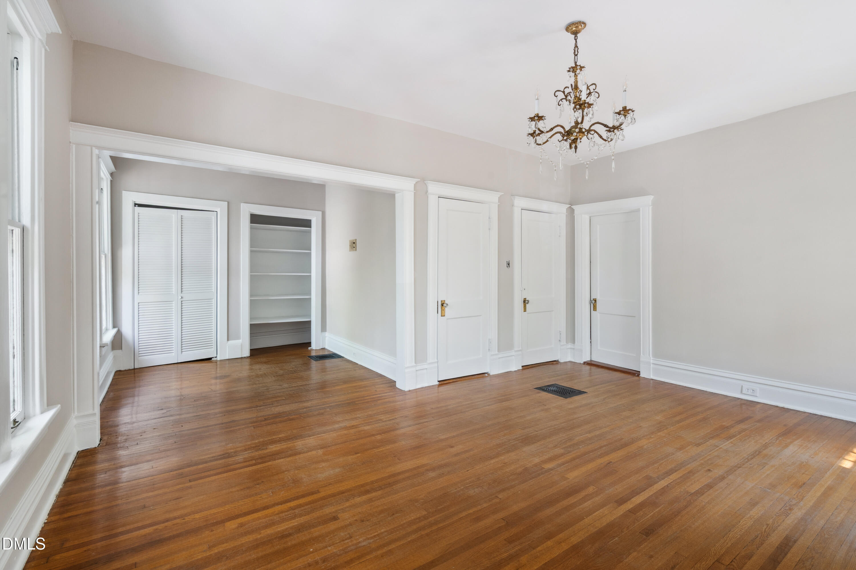 116 Hawthorne Road Raleigh, NC 27605 - Photo 37 of 61 a view of an empty room with wooden floor