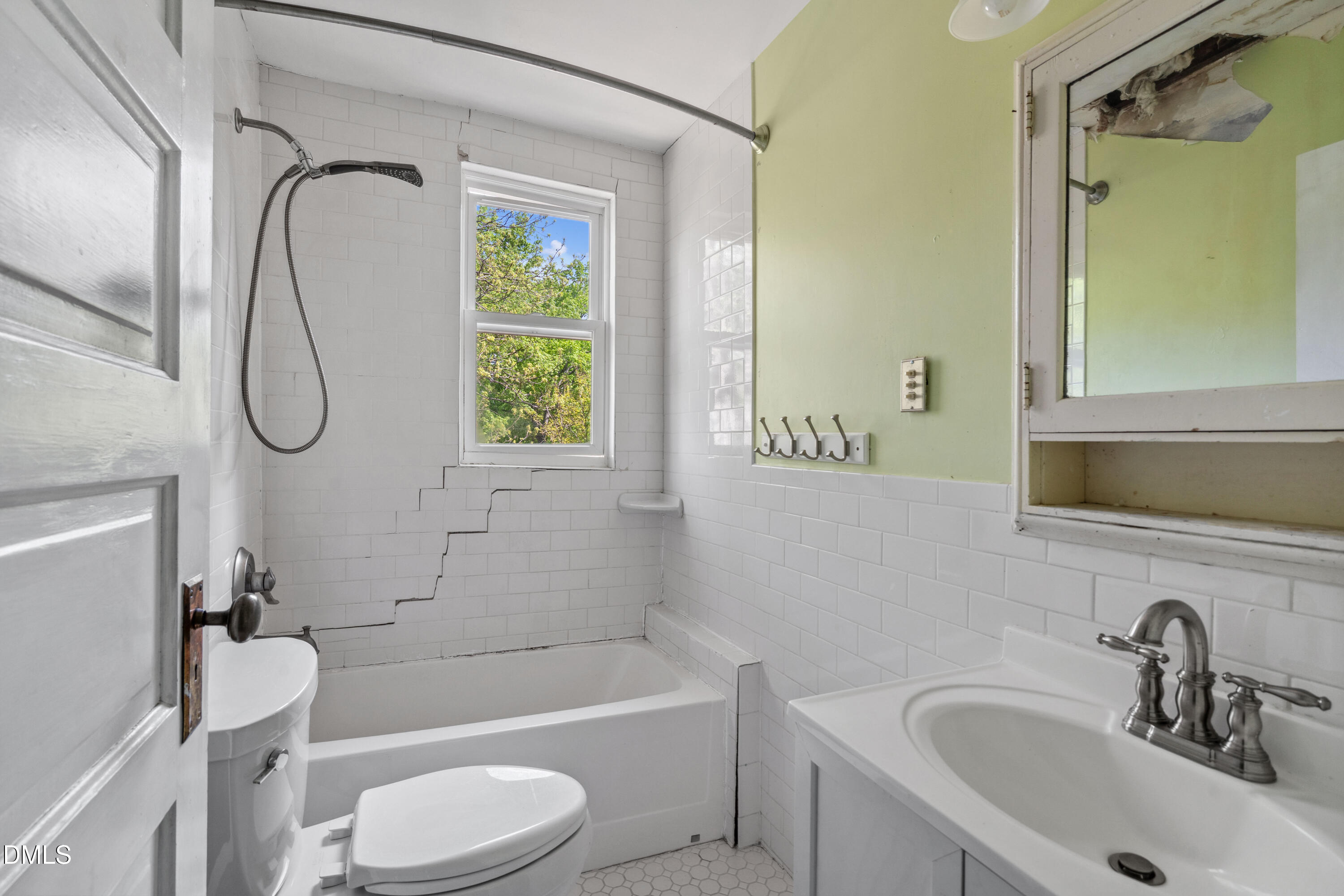 116 Hawthorne Road Raleigh, NC 27605 - Photo 46 of 61 a bathroom with a sink toilet and shower
