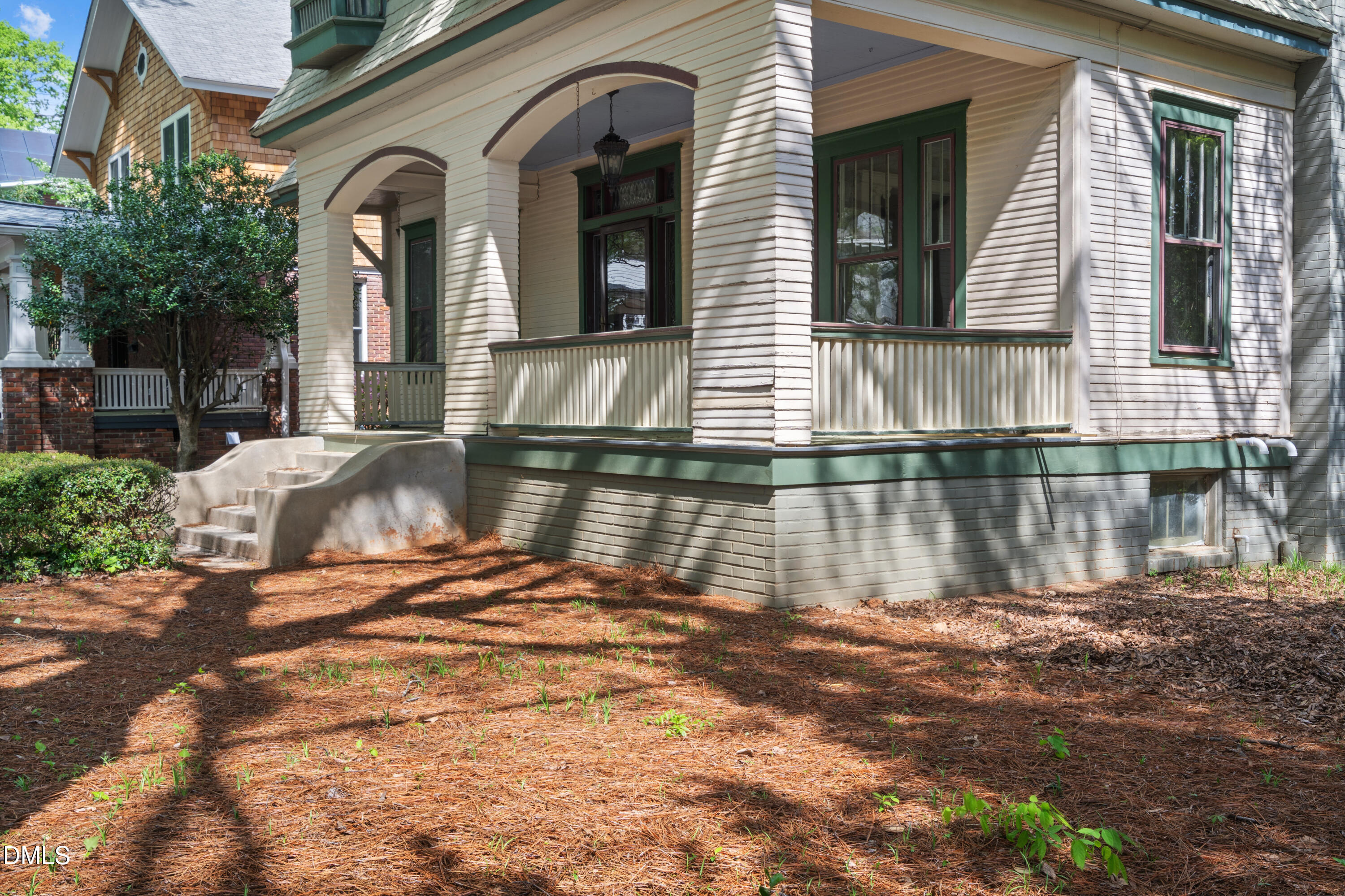 116 Hawthorne Road Raleigh, NC 27605 - Photo 5 of 61 a front view of a house with a yard
