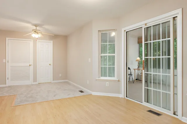 an empty room with windows