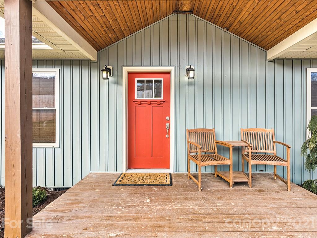 85 Dry Ridge Canton, NC 28716 - Photo 2 of 18 a chair and table sitting in front of a room