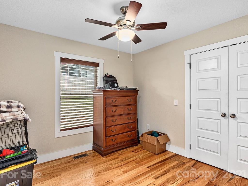 85 Dry Ridge Canton, NC 28716 - Photo 13 of 18 a bedroom with a bed and a window
