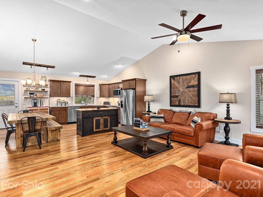 85 Dry Ridge Canton, NC 28716 - Photo 3 of 18 a living room with furniture kitchen view and a wooden floor