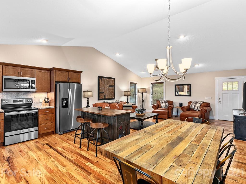 85 Dry Ridge Canton, NC 28716 - Photo 5 of 18 a living room with stainless steel appliances kitchen island granite countertop furniture and a kitchen view