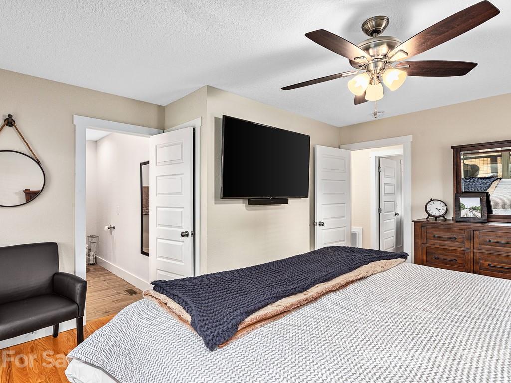 85 Dry Ridge Canton, NC 28716 - Photo 9 of 18 a bedroom with a bed and a flat screen tv