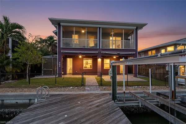 a view of a lake from a balcony