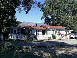 228 Ortega Ridge Road Summerland, CA 93067 - Photo 2 of 2 a front view of a house with a yard