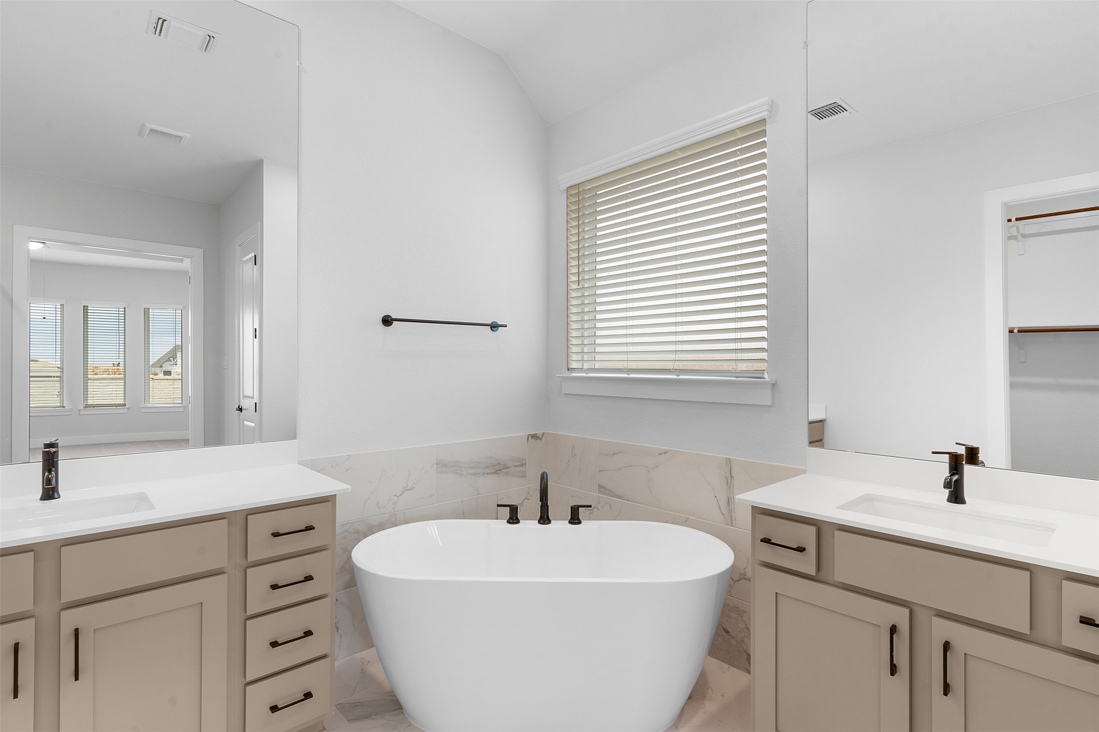 2212 Tobiano Trace Georgetown, TX 78633 - Photo 18 of 26 a bathroom with a sink and a bathtub